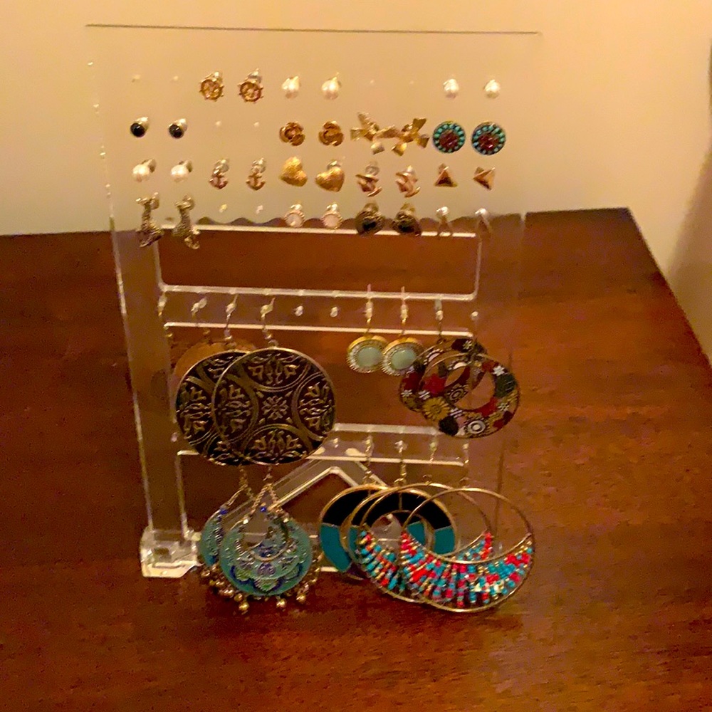 23 pairs of earrings plus stand